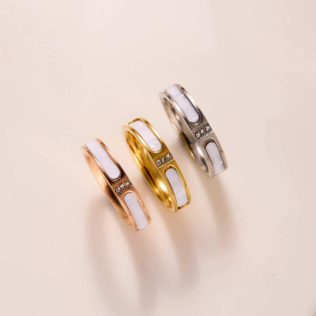 Fashionable Light Luxury Three-Diamond White Shell Titanium Steel Ring For Women,...