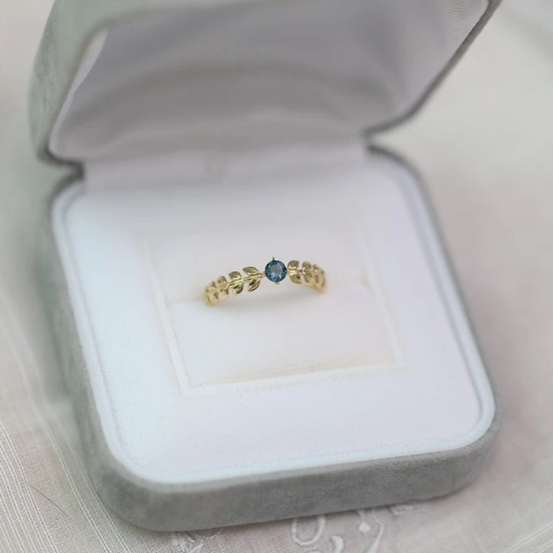 Blue-Accent Leaf Ring in Gold-Tone Silver