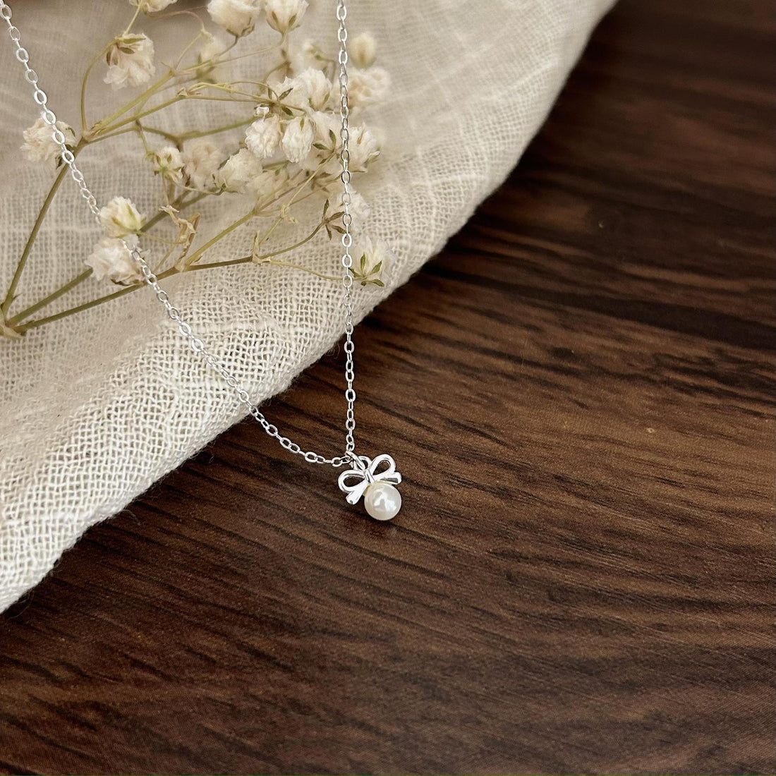 Petite Bow & Pearl-Accent Necklace in Gold-Tone Silver