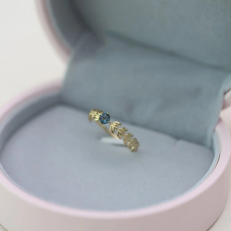 Blue-Accent Leaf Ring in Gold-Tone Silver