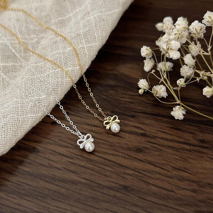 Petite Bow & Pearl-Accent Necklace in Gold-Tone Silver - view 3