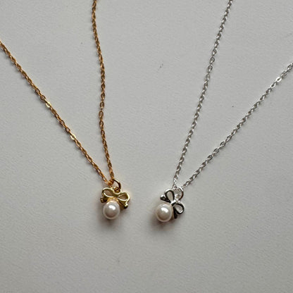 Petite Bow & Pearl-Accent Necklace in Gold-Tone Silver - view 8