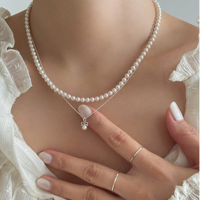 Petite Bow & Pearl-Accent Necklace in Gold-Tone Silver