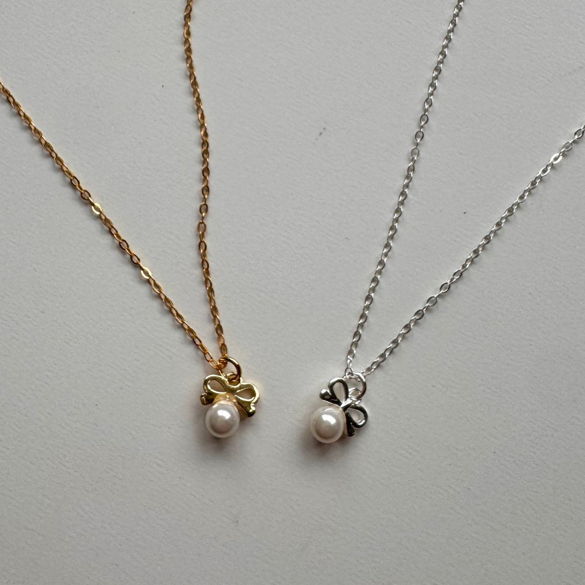 Petite Bow & Pearl-Accent Necklace in Gold-Tone Silver - view 5