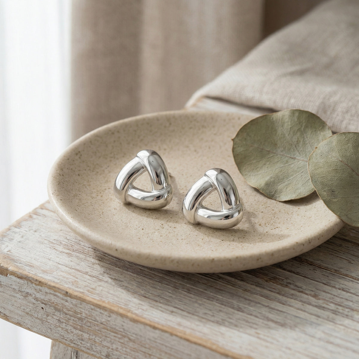 Triangular Knot Stud Earrings in Silver — product photograph 1