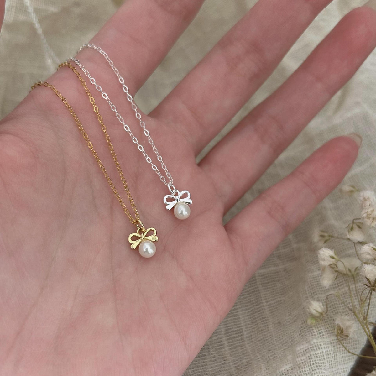 Petite Bow & Pearl-Accent Necklace in Gold-Tone Silver - view 2
