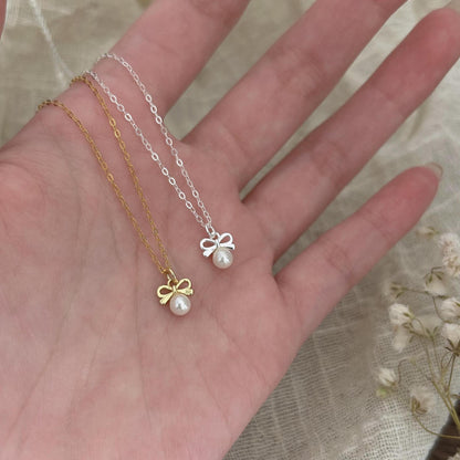 Petite Bow & Pearl-Accent Necklace in Gold-Tone Silver - view 2