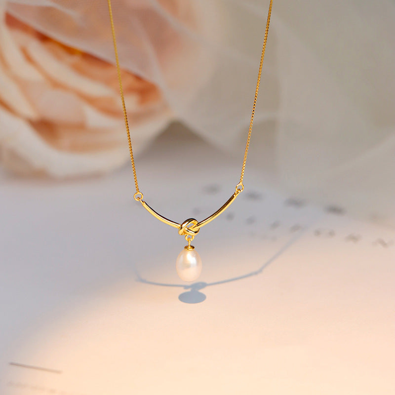 Knot & Pearl Drop Necklace in Gold-Tone Silver - view 5