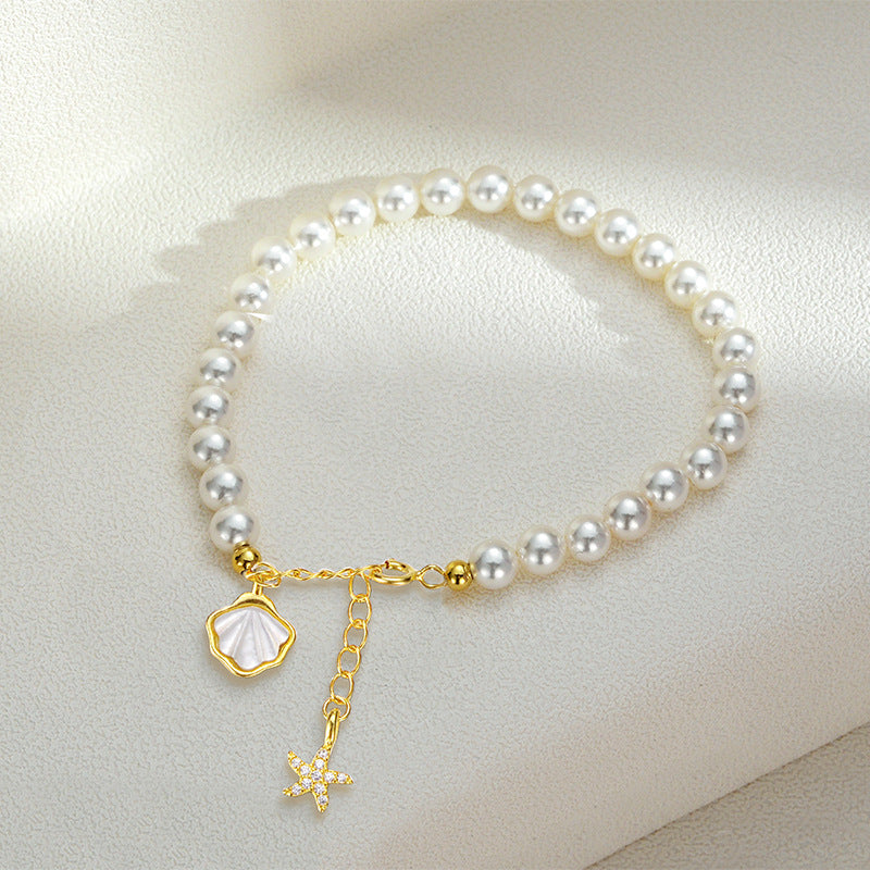 Pearl & Silver Accent Bracelet with Gold-Tone Details