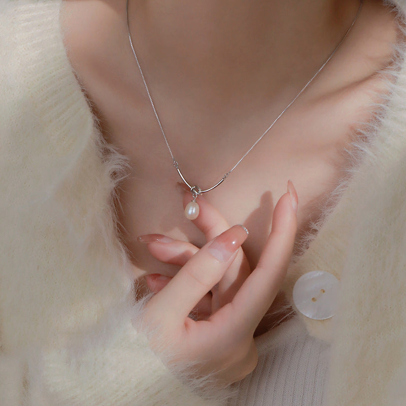 Knot & Pearl Drop Necklace in Gold-Tone Silver