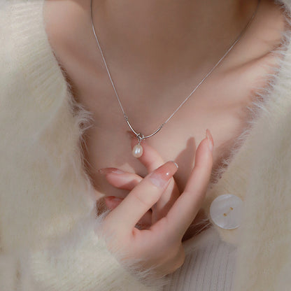 Knot & Pearl Drop Necklace in Gold-Tone Silver - view 2