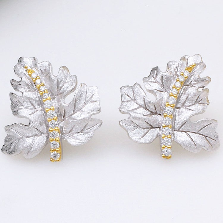 Gilded Leaf Stud Earrings in Silver — product photograph 1