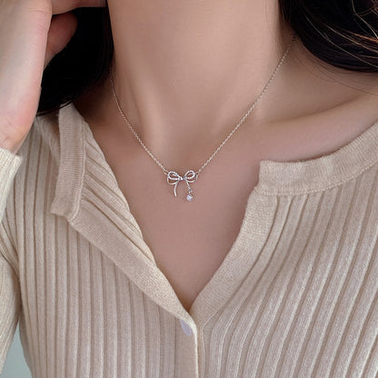 Fine Bow Pendant Necklace in S925 Silver - view 1